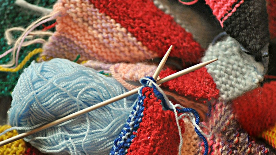 布を織る「織」のイメージ